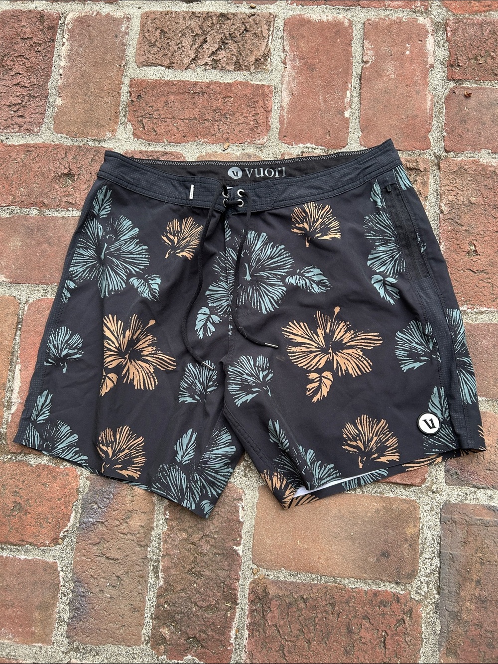 Vuori Black Swim Shorts with Teal & Tan Floral Print